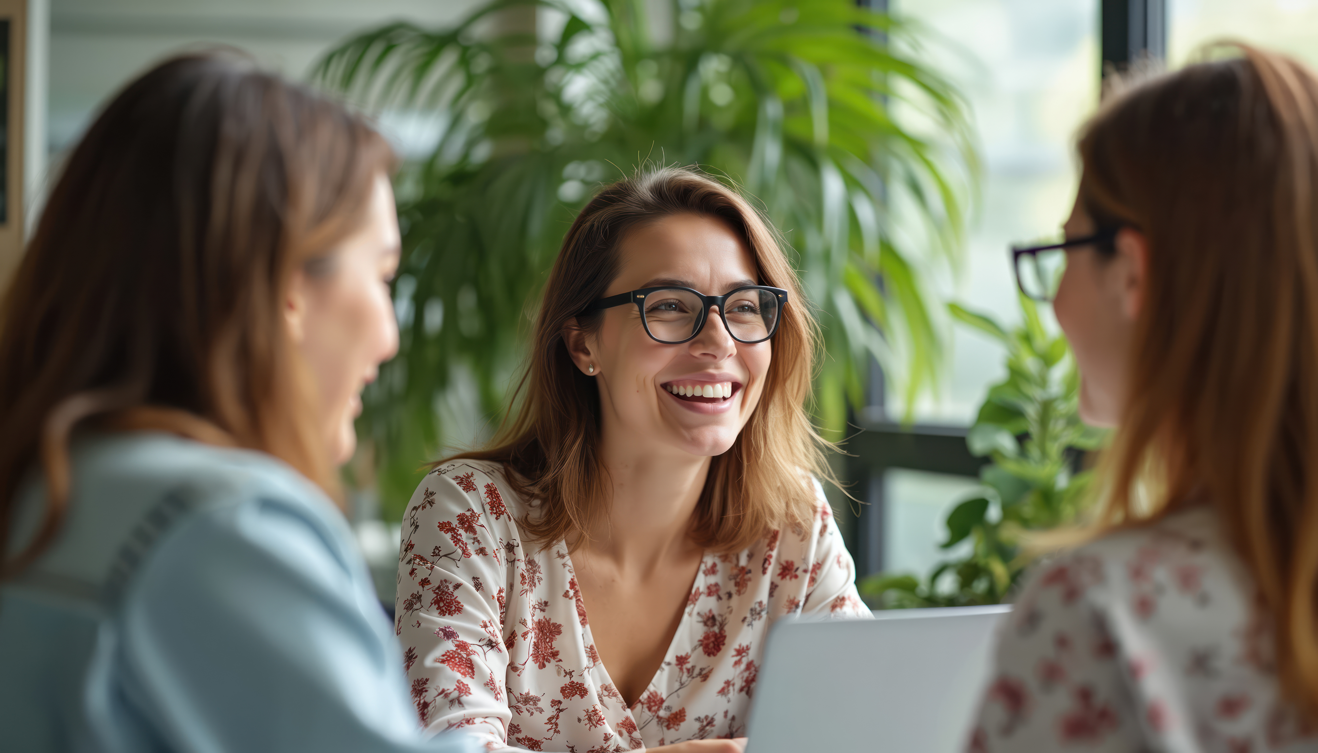three-women-laughing-in-office-meeting.jpeg (2)