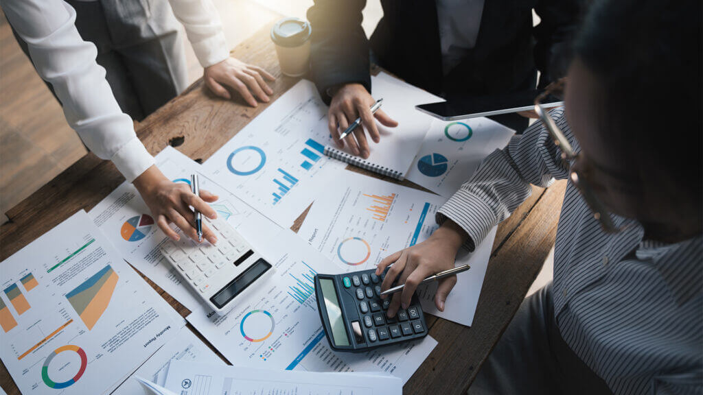 business-team-reviewing-cash-flow-charts-in-office-1024x576.jpg